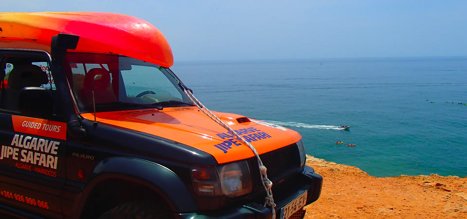 Orange Algarve Jipe Safari jeep on the cliffs above the Atlantic
