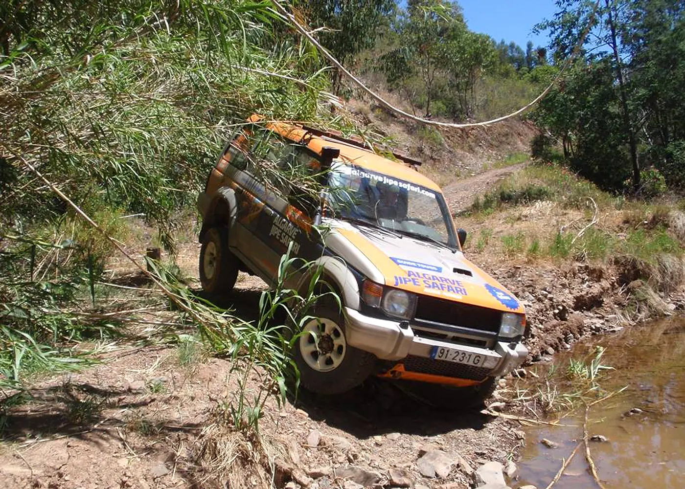 Algarve Jipe Safari vehicle descending an off-road track